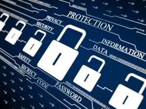Cybersecurity essentials: padlocks and key terms highlight data protection in the digital age.