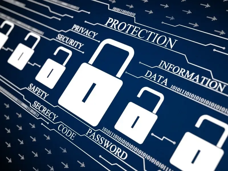 cybersecurity essentials: padlocks and key terms highlight data protection in the digital age.