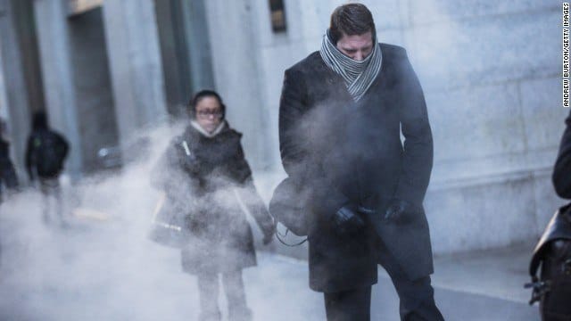 urban winter scene: individuals bundled up, showcasing resilience against the cold and steam.