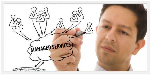 collaborative brainstorming on managed services, highlighting teamwork in a professional setting.