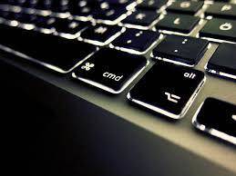 modern apple keyboard close-up, showcasing sleek design and productivity-enhancing features.