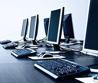 Find The Right Tech Support For Small Businesses 8 modern workspace with organized computer stations fostering productivity in tech support solutions.
