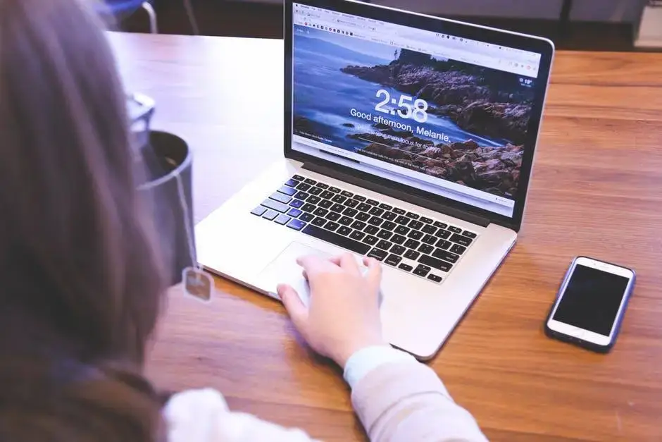 Tranquil workspace combining modern technology, coffee, and nature for enhanced productivity.