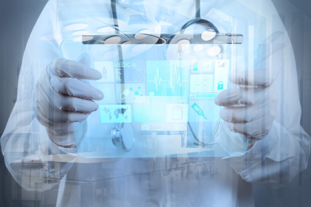doctor using a digital tablet, showcasing advanced medical data in a clinical setting.
