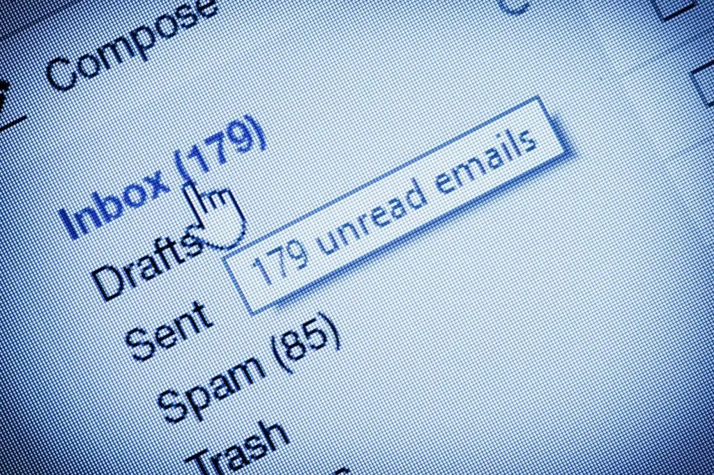Close-up of an email inbox with 179 unread messages and organized folder options.
