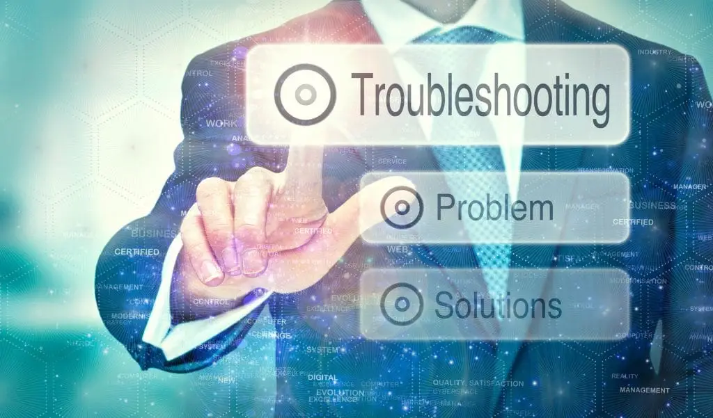 5 Ways To Improve Your Technology Troubleshooting 3 businessman troubleshooting on a digital interface in a modern, professional setting.